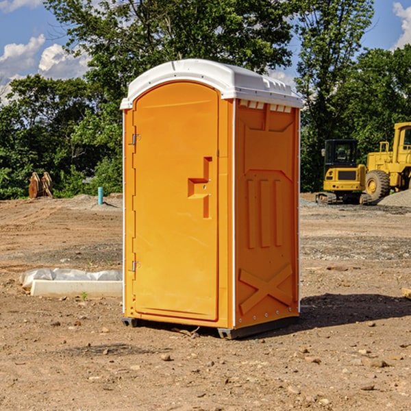 how often are the portable restrooms cleaned and serviced during a rental period in Keene